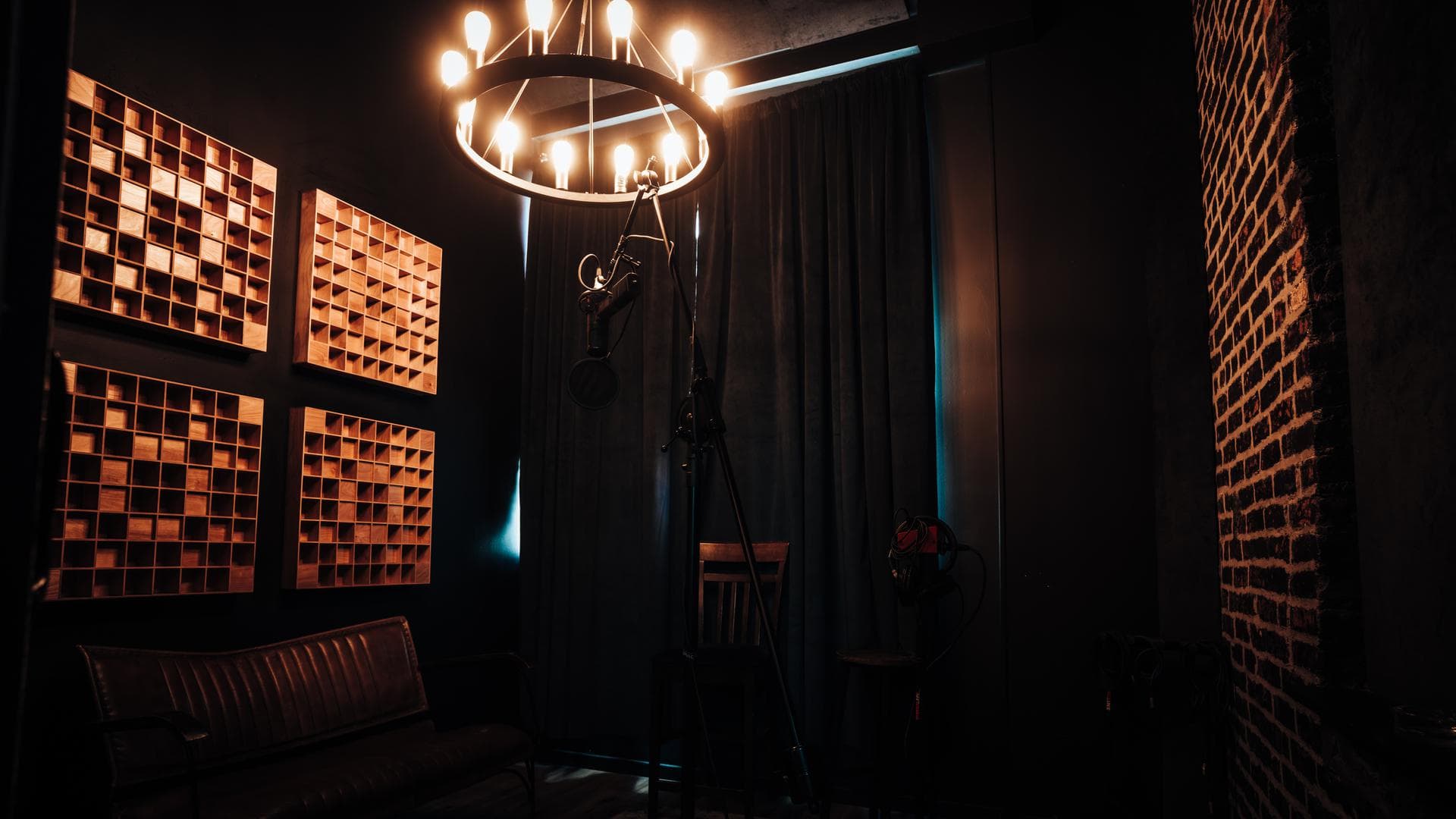 The Weddington room at Weddington Studios with Edison bulbs, reclaimed wood, and a heritage speakeasy feel